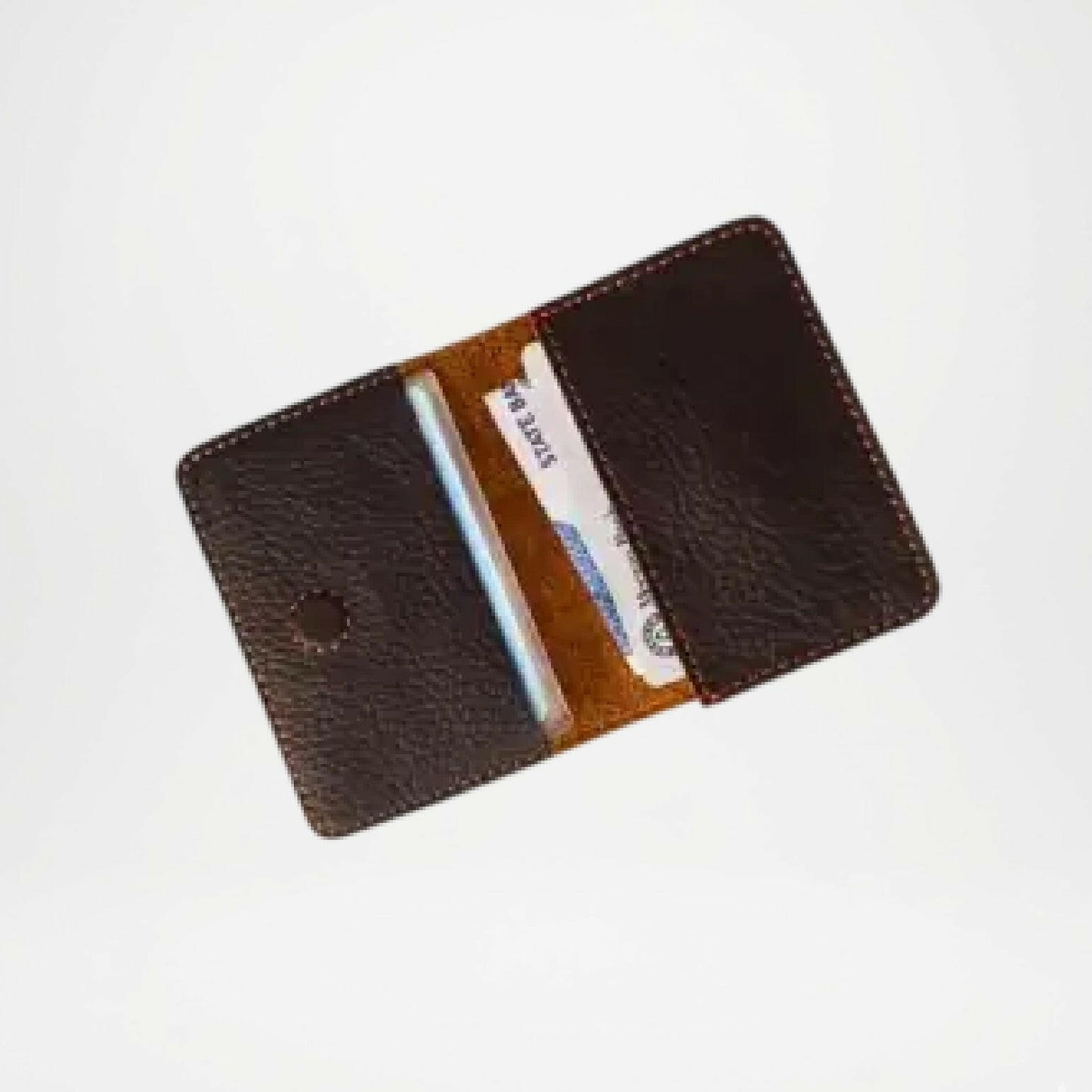 Brown leather wallet with a card slot on a white background