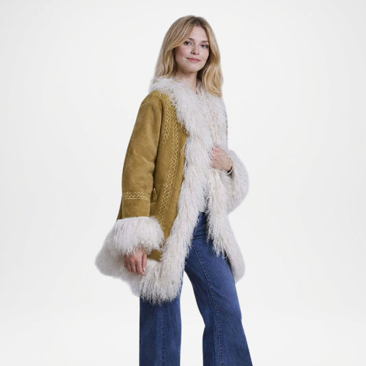 Woman wearing a mustard-colored coat with white fur trim