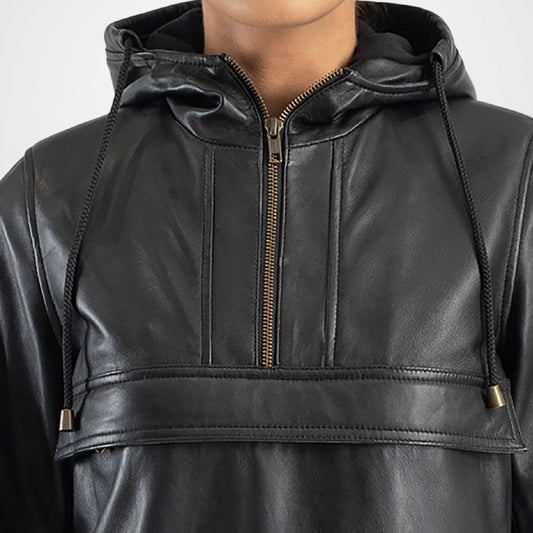 Close-up of a black leather jacket with a hood