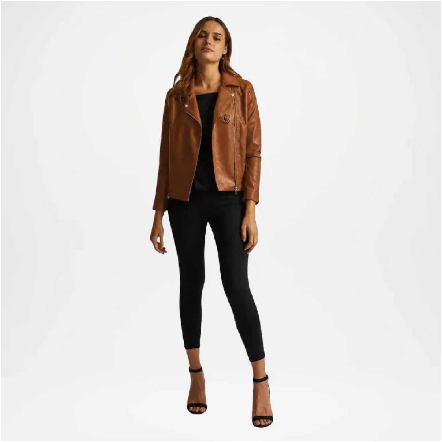 Woman wearing a brown leather jacket and black pants