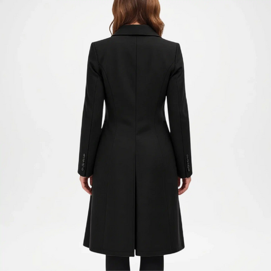 Black coat worn by a person on a white background