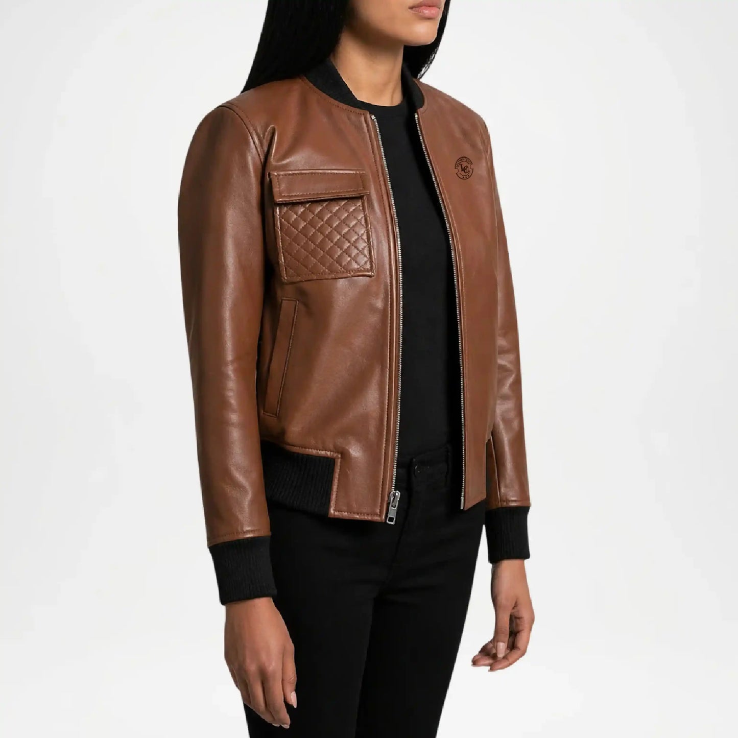 Brown leather jacket worn by a person on a white background