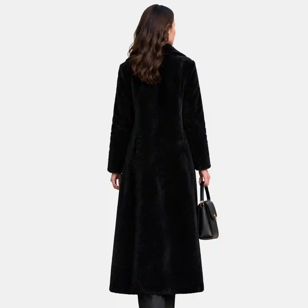 back view of black faux fur coat women