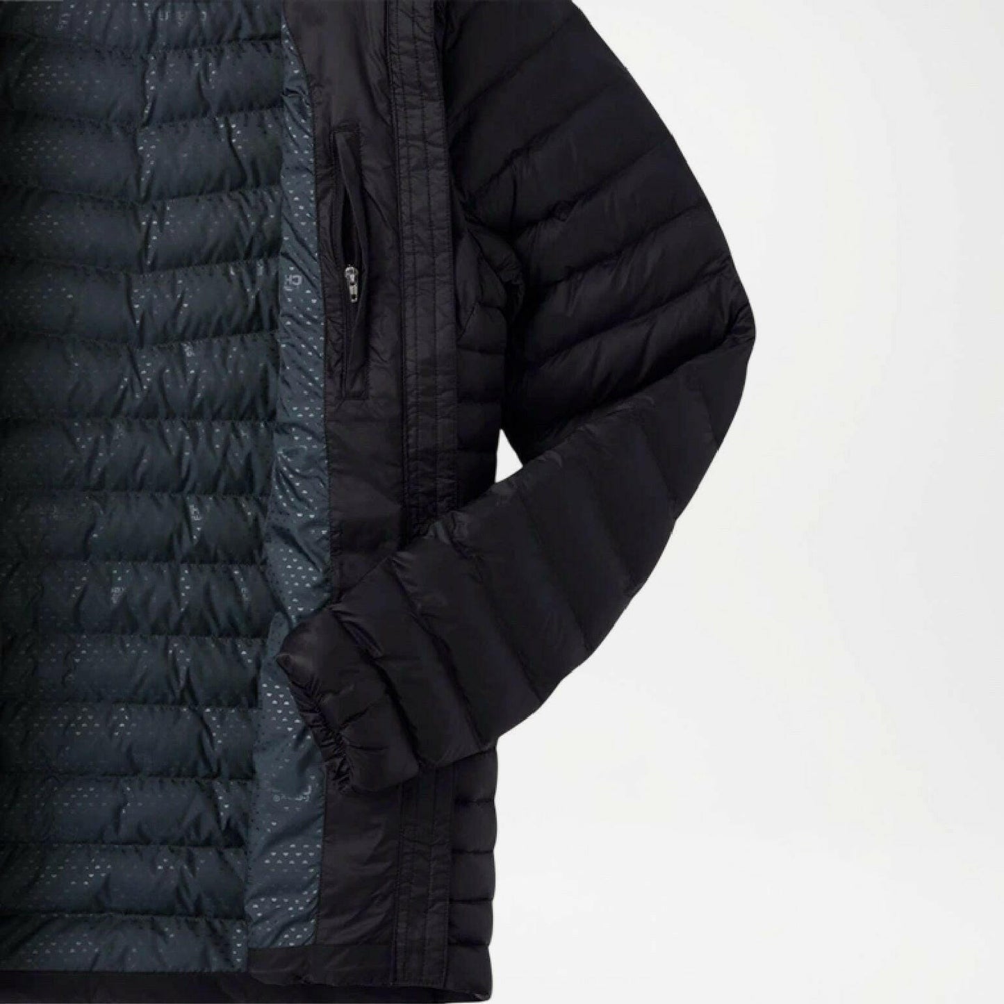 Black quilted jacket with a close-up of the sleeve