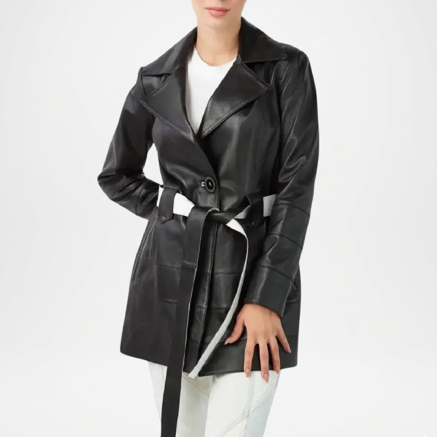 Black leather coat worn by a person on a white background