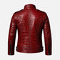 A red faux-crocodile leather jacket shown from the back, featuring a high collar, zippered side details, and a textured embossed pattern, set against a plain light gray background.