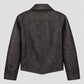 A dark charcoal gray faux leather jacket shown from the back, featuring a collar, long sleeves with buttoned cuffs, and a distressed texture, set against a solid light gray background.