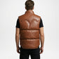 Man wearing a brown leather vest on a white background
