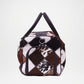 Patchwork patterned handbag with black handles 