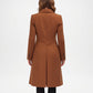 Brown coat worn by a person back view