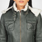 Green leather jacket closer with white fur lining