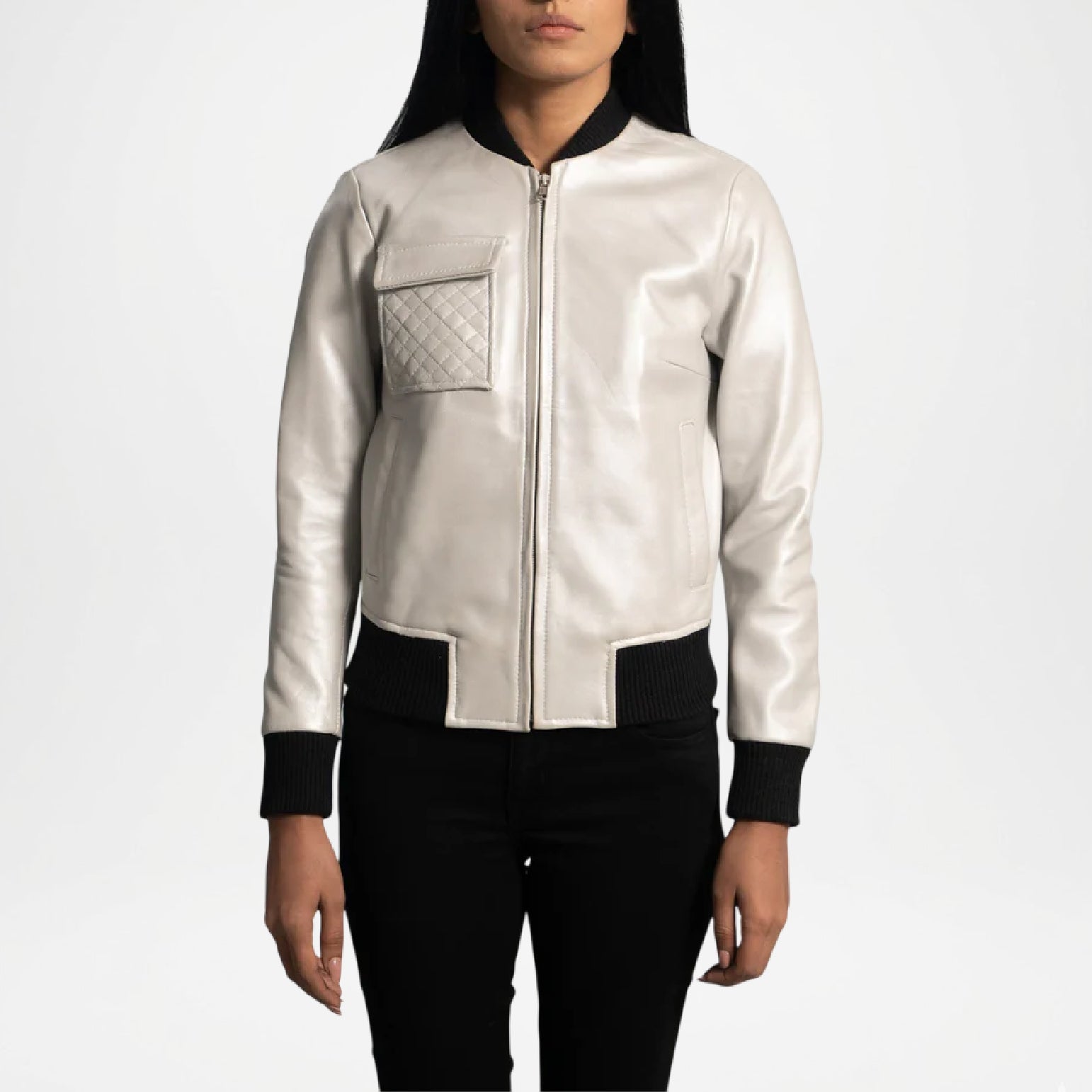 Person wearing a silver jacket with black accents on a white background
