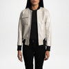Person wearing a silver leather jacket on a white background