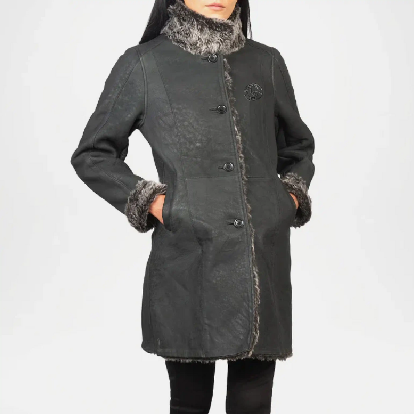 Dark gray coat with fur trim on a white background