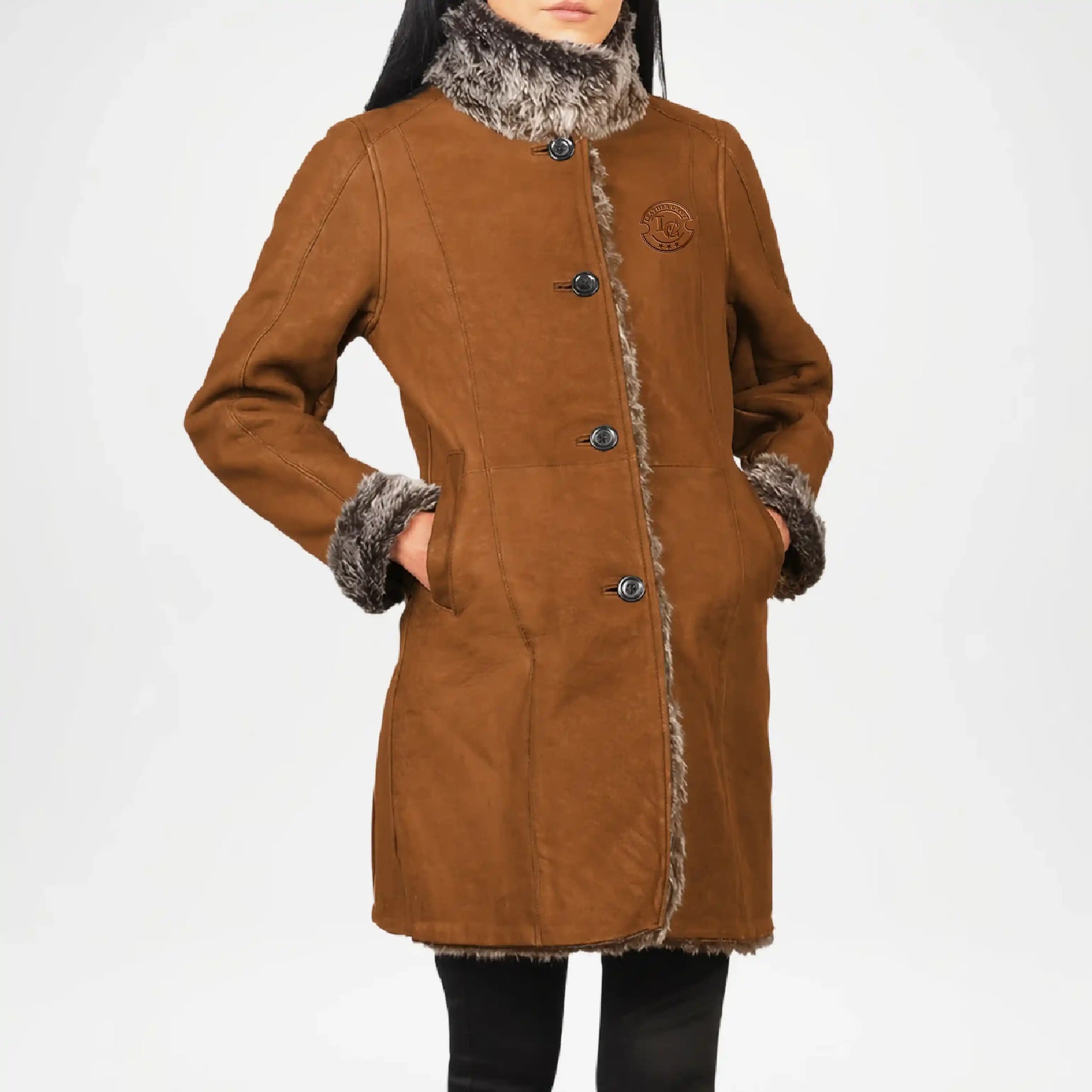 Brown coat with fur trim on a white background