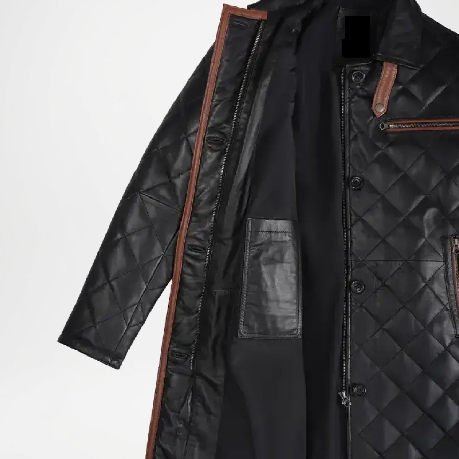 Black quilted coat with brown accents on a white background