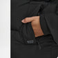 Close-up of a hand adjusting the hood of a black puffer jacket