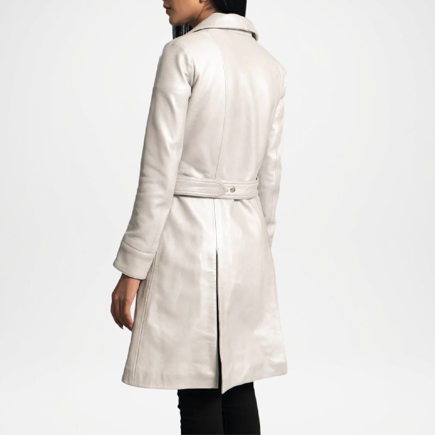 Person wearing a light-colored coat women back view