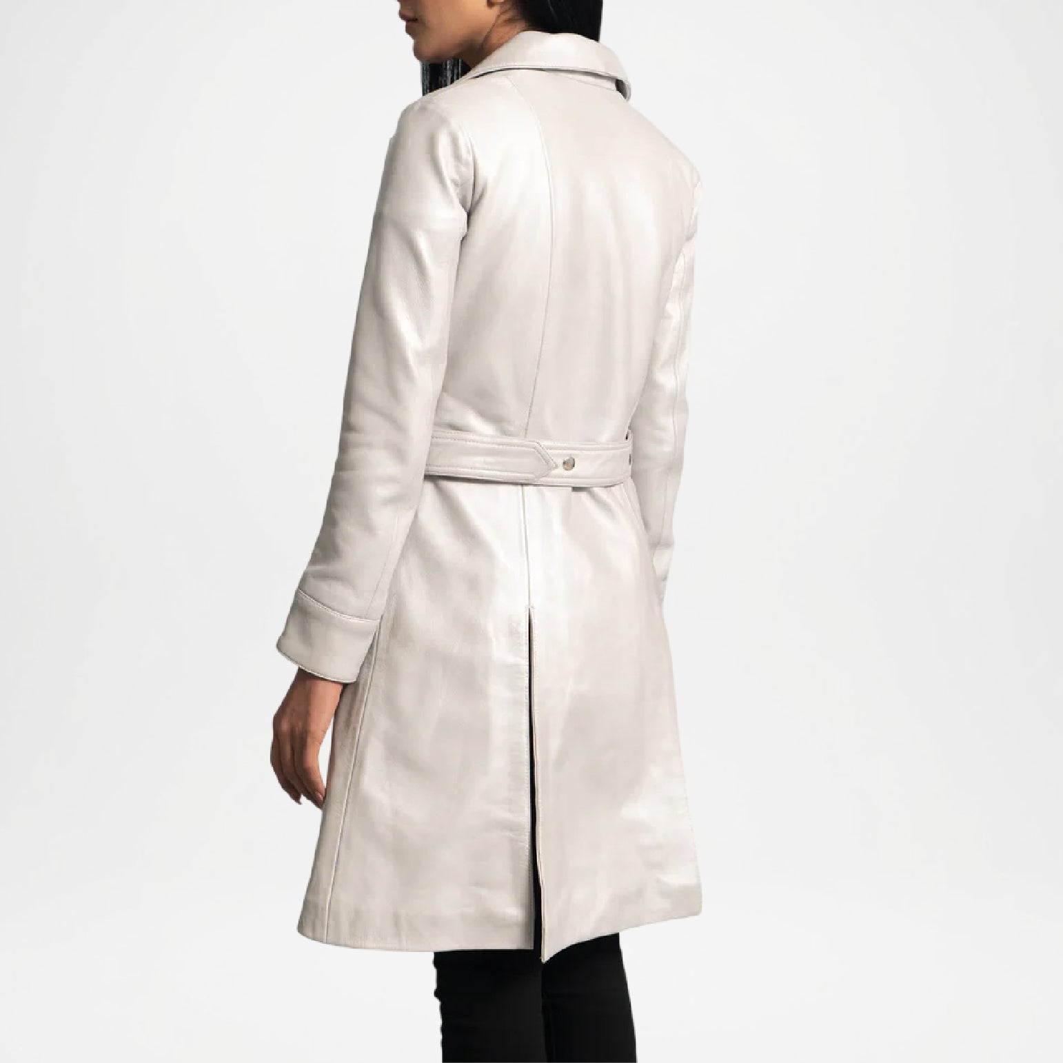 Person wearing a light-colored coat women back view