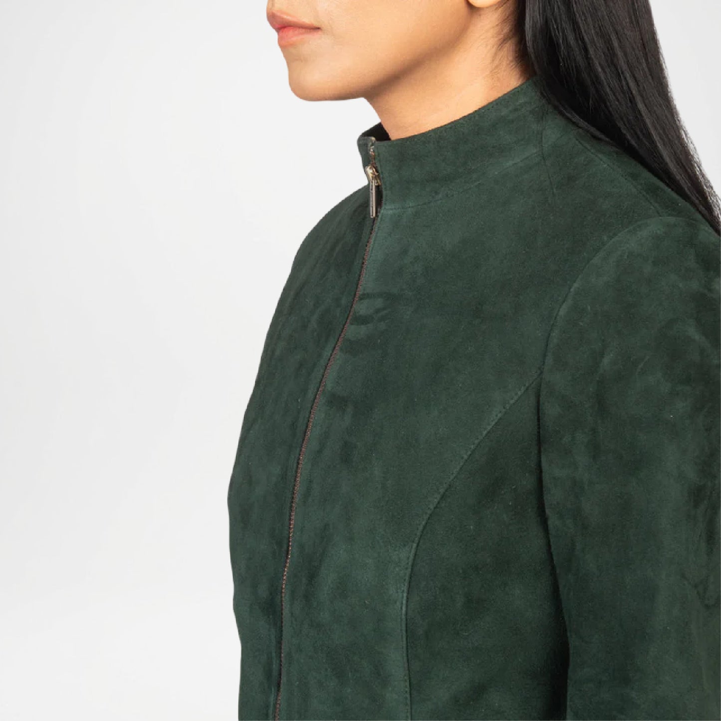 Green suede jacket worn by a person on a white background