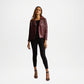Woman wearing a burgundy leather jacket