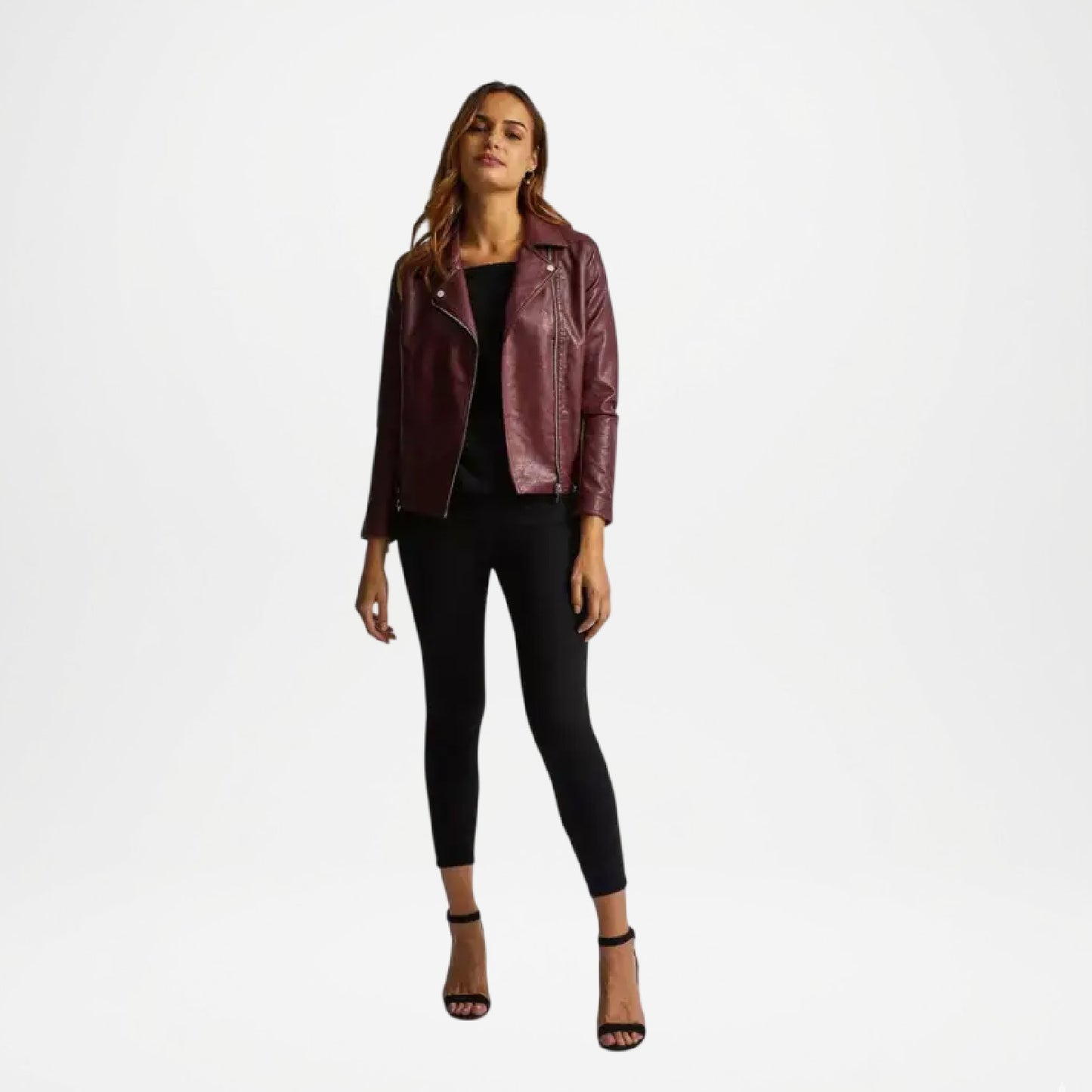 Woman wearing a burgundy leather jacket