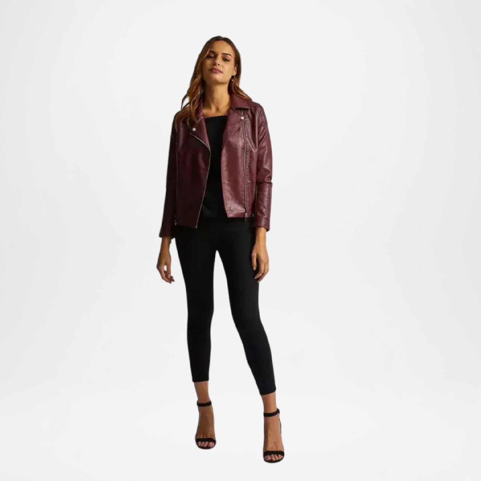 Woman wearing a burgundy leather jacket