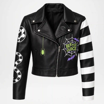 Black faux leather moto jacket with a 'Beetlejuice' spiderweb graphic on the chest, a green spider hanging from the zipper pull, a black-and-white striped right sleeve, a white-and-black snake print on the left sleeve, and a white skull graphic on the right shoulder.