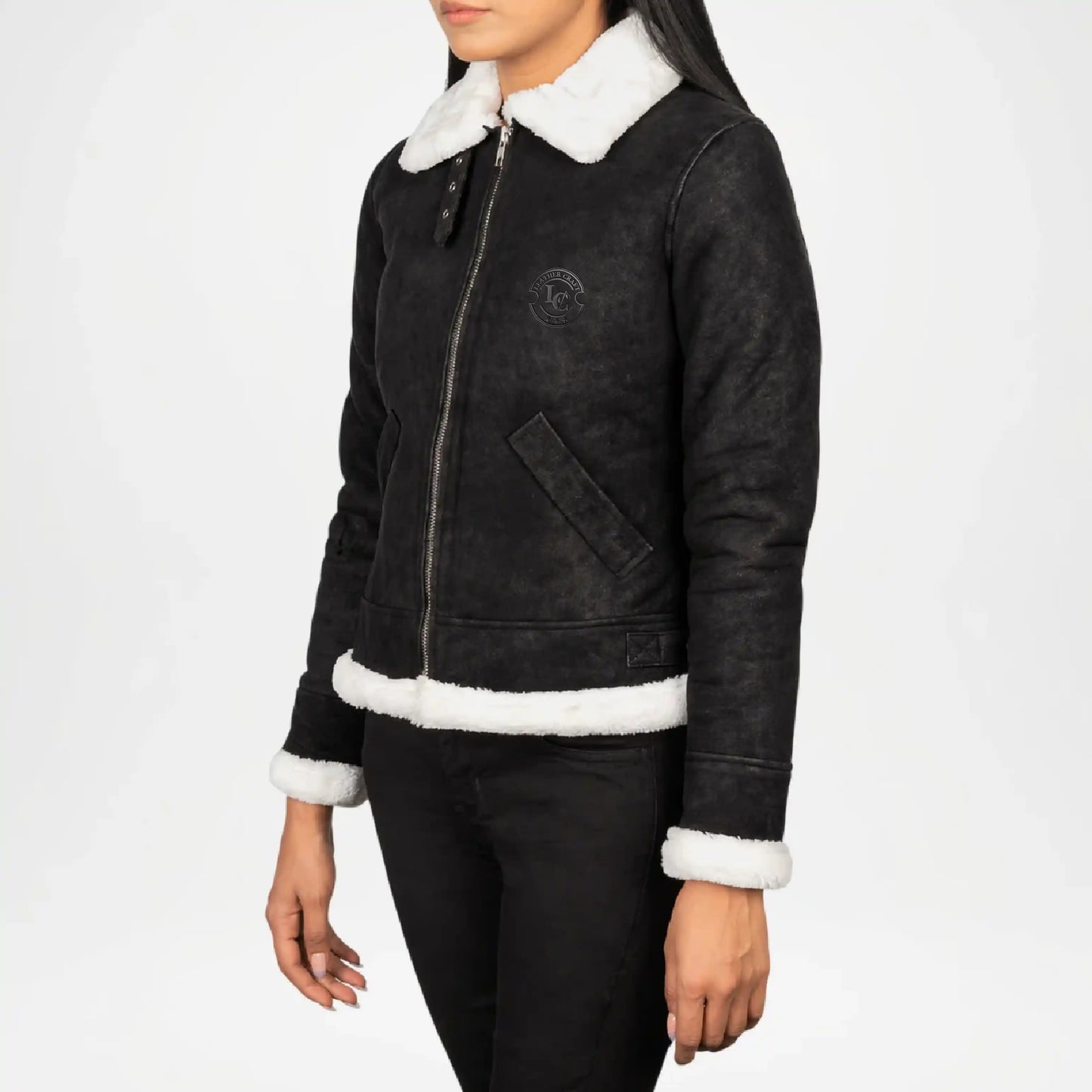 Black jacket with white fur trim on a white background