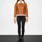 Person wearing a brown leather jacket with white fur lining 