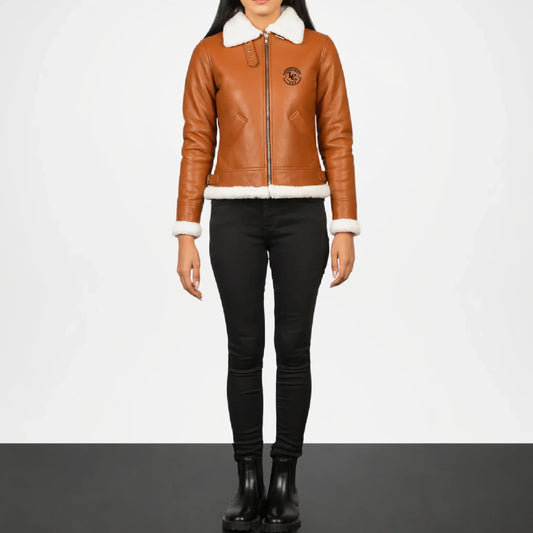 Person wearing a brown leather jacket with white fur lining 