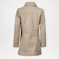 Beige leather coat on a white background