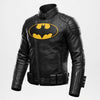 Black leather motorcycle jacket featuring a large yellow Batman logo on the chest, shown on a light gray background.