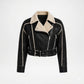 A cropped black faux-leather biker jacket with a beige sherpa fleece collar, beige contrast stitching, and a matching beige-and-black belted waist, shown on a plain white background.