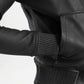 Close-up of a black leather jacket with textured details 