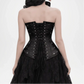 Black corset worn by a model on a white background