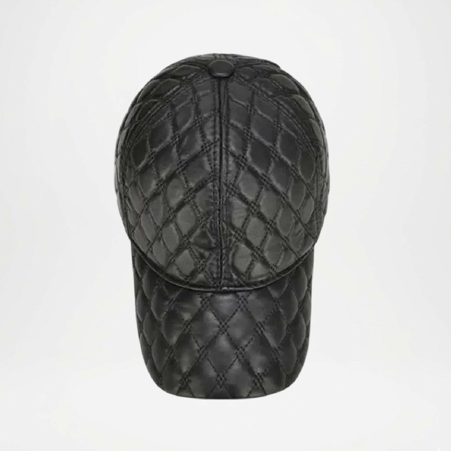 Black quilted baseball cap on a white background
