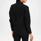 Person wearing a black bomber jacket on a white background