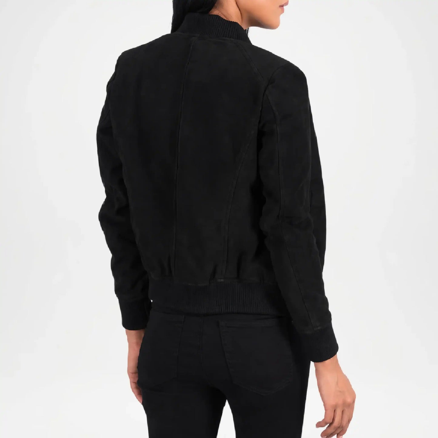 Person wearing a black bomber jacket on a white background