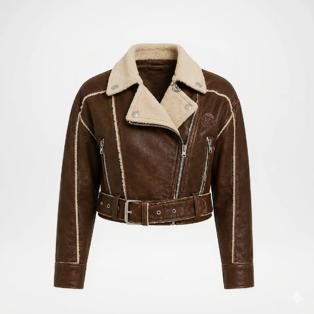 A brown faux-leather aviator-style jacket with a beige sherpa lining, featuring a belted waist, zippered front, and silver-tone hardware on a light gray background.