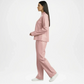 Woman wearing a pink suit Leather