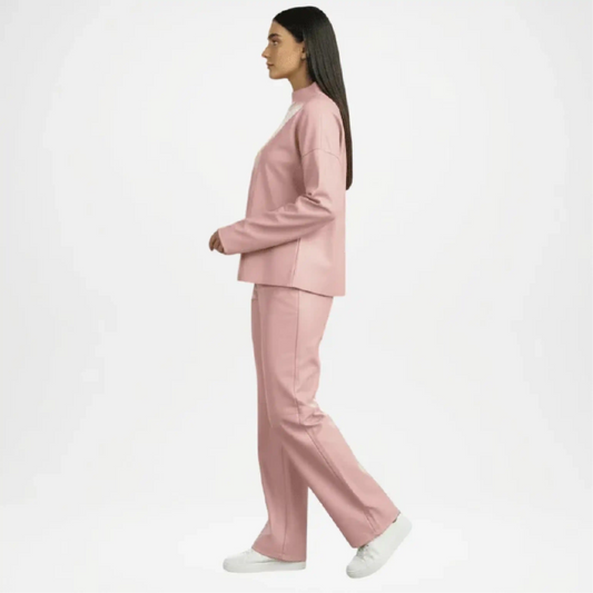 Woman wearing a pink suit Leather
