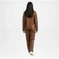Person wearing a brown outfit on a white background