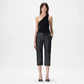 Woman wearing black leather pants and a black top outfit