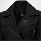 Close-up of a black leather jacket