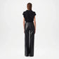 black leather flare pants back view
