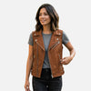 Woman wearing a brown leather vest