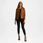 Woman wearing a brown leather jacket and black pants