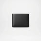 Black leather wallet on a light gray background