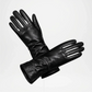 Pair of Long black leather gloves on a white background